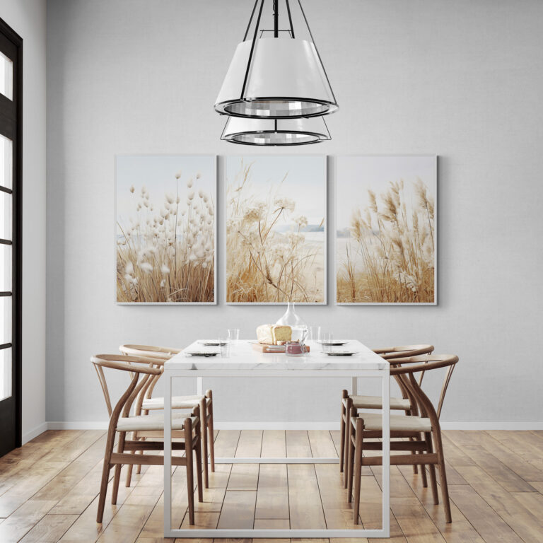 Dried Grass Neutral Botanical Prints Set of 3 wall art in a dining room with large light fixtures
