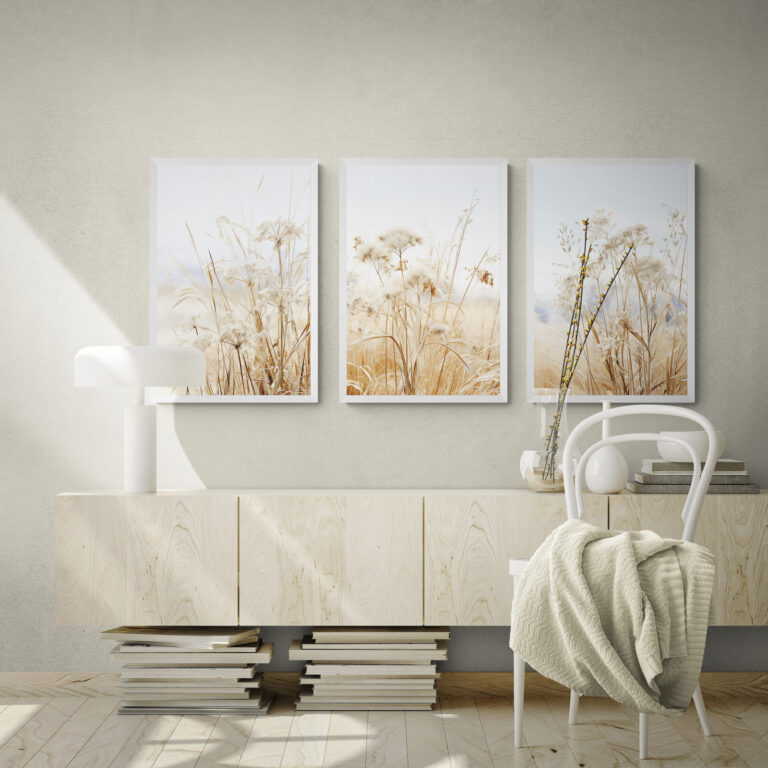 Dried Grass Neutral Botanical Prints Set of 3 wall art in a bright neutral living room over a wooden cabinet
