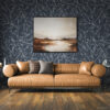 Coastal Serenity at Dusk - Sunset Wall Art in a Modern Living Room with Leather Sofa