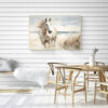 Running Horse on the Beach Wall Art - 3x2 Aspect Ratio - Natural Wood Floating Frame Canvas in a Scandinavian Dining Room with Minimalist Wooden Table and Chairs and Shiplap Walls