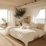 Light Airy Ocean View Decor – Summer Bedroom Refresh – White Bedding Jute Rug Wooden Floor