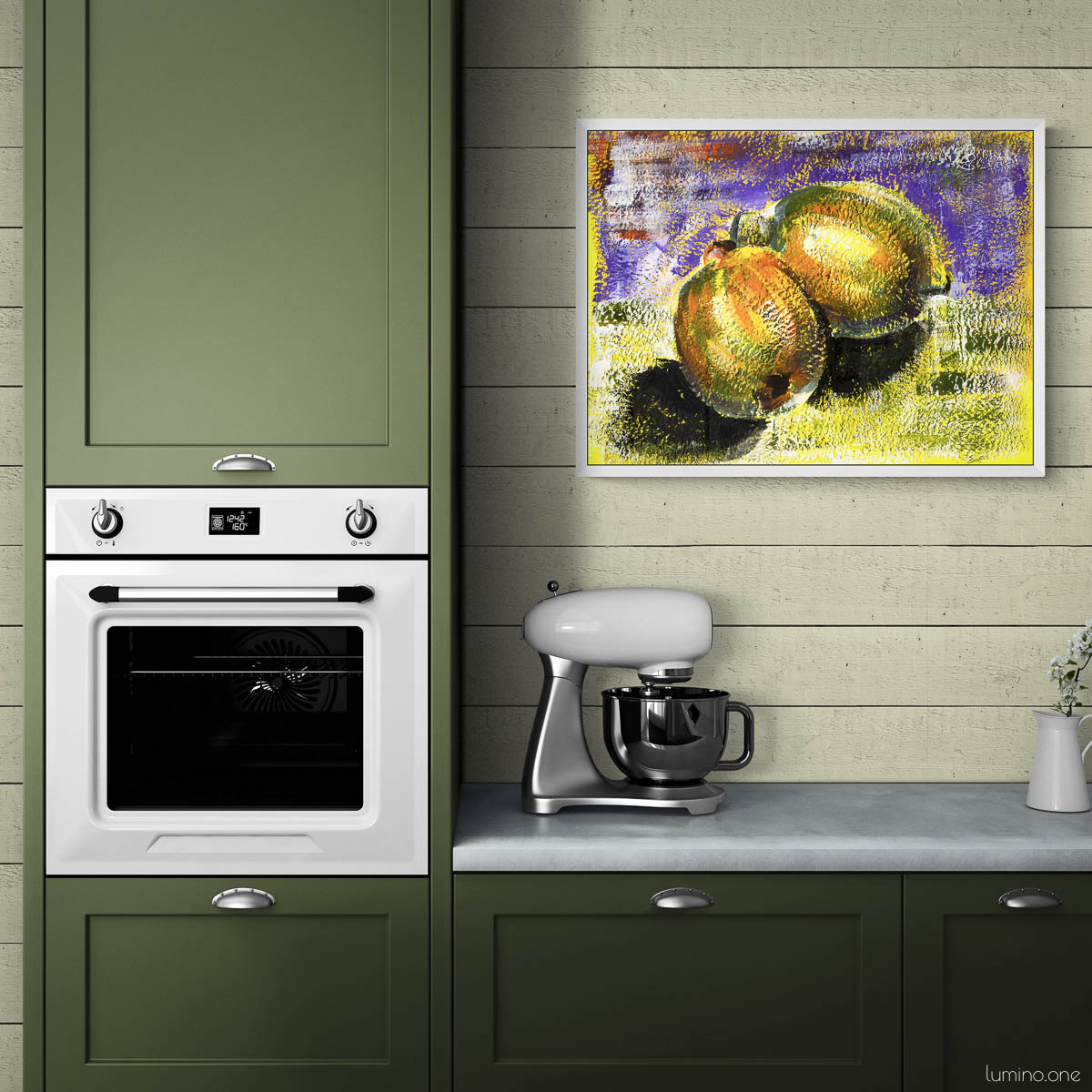 Lemon wall art print in white frame displayed in modern sage green kitchen with shiplap walls. Colorful citrus fruit painting with vibrant purple and yellow background hanging above countertop with stand mixer and small vase. Impressionist style kitchen decor that complements green cabinets and white appliances for farmhouse or contemporary kitchen design.