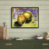 Lemon artwork in black frame displayed on light shiplap wall above green kitchen cabinet. Impressionist citrus painting with vibrant purple and yellow tones, styled with wooden cutting boards, kitchen utensils, stacked plates and wooden bowls. Farmhouse kitchen decor with natural wood accents, perfect for fruit themed kitchen wall art, dining room decor, or cottage style home.