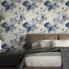 Classic blue peony toile wallpaper as dramatic bedroom statement wall with neutral bedding, modern platform bed and minimalist decor