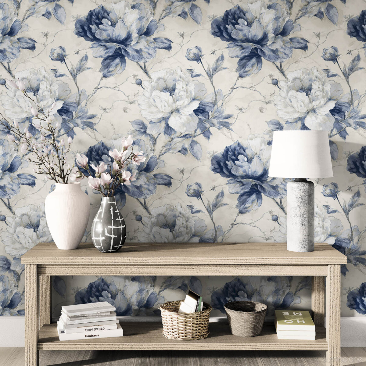 Classic blue peony toile wallpaper as dramatic living room statement wall with wooden console table, neutral decor and natural lighting