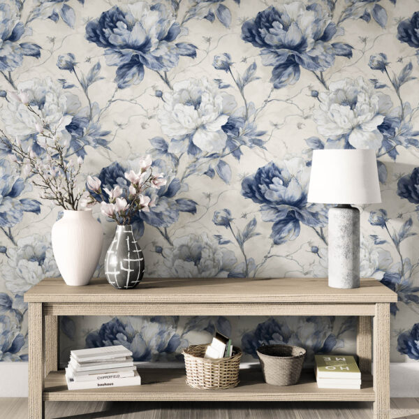 Classic blue peony toile wallpaper as dramatic living room statement wall with wooden console table, neutral decor and natural lighting