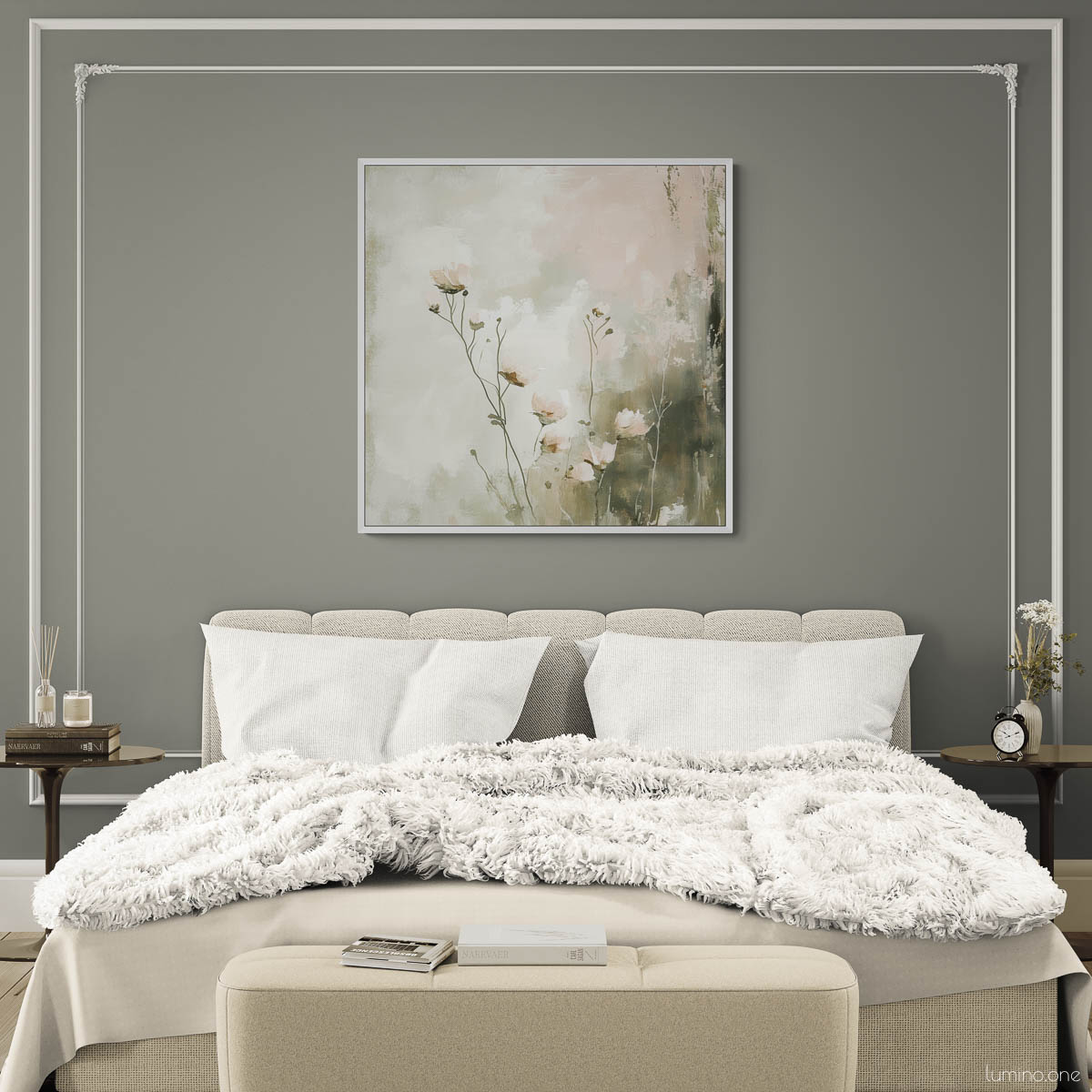Botanical canvas print featuring sage green wildflowers in white float frame, displayed above neutral upholstered bed with tufted headboard in modern master bedroom with gray accent wall, white bedding, and decorative wall molding