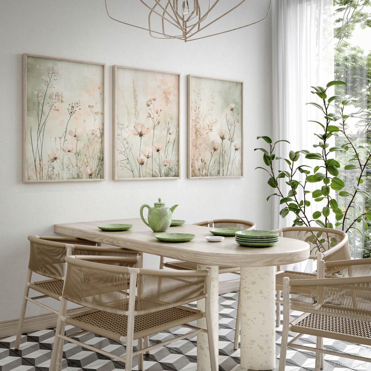 Set of three framed botanical prints featuring delicate wildflowers and grasses in soft neutral tones, displayed above a round natural wood dining table with woven rattan chairs and green ceramic dishes in a bright modern dining room with large windows and plants
