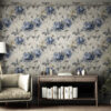 Vintage blue peony toile wallpaper in cozy reading nook with wooden console table, comfortable chair and natural lighting