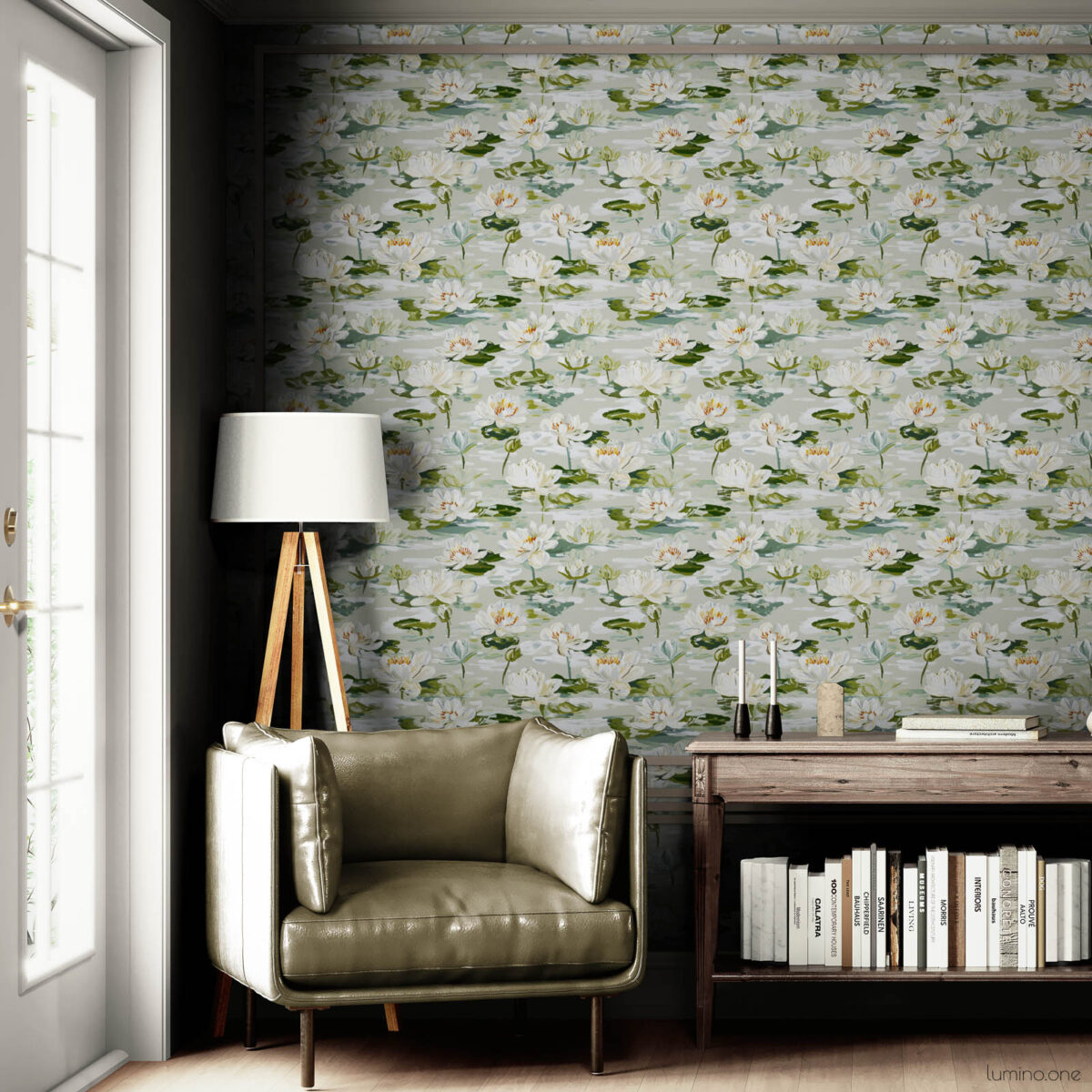 Serene water lily botanical wallpaper accent wall in reading corner featuring olive green leather armchair, tripod floor lamp, rustic wood console table with books, and potted olive tree creating a tranquil home library space