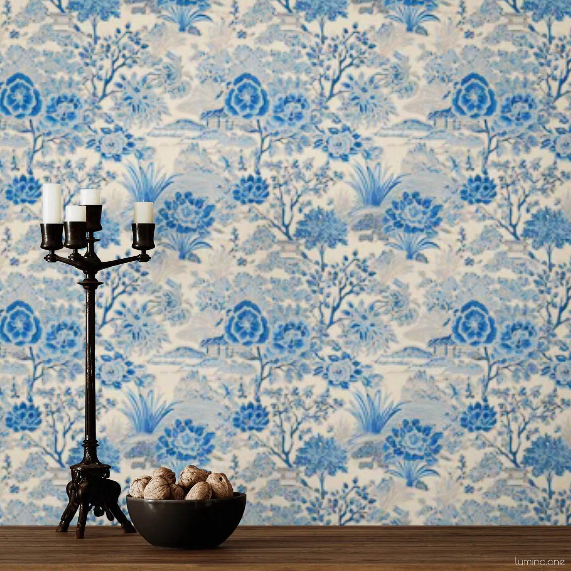 Blue Toile Peel and Stick Wallpaper - Vintage Botanical Garden P Blue and white toile peel and stick wallpaper covering a full wall, featuring a repeating vintage botanical garden pattern with flowers and trees. Styled with a dark iron candelabra, rustic white vase with red berry branches, and a wood console - living room or dining room accent wall decor.