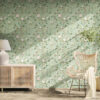 Chinoiserie Bird Wallpaper Peel and Stick - Sage Green Botanical Sage green chinoiserie removable wallpaper with hand-painted birds, pink peonies, and botanical branches in sunlit room with natural rattan credenza, white ceramic lamp, wicker peacock chair, and potted tree