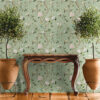 Chinoiserie Bird Wallpaper Peel and Stick - Sage Green Botanical Sage green chinoiserie removable wallpaper with hand-painted birds, pink peonies, and lemon branches styled with vintage wooden console table, terracotta planters, and potted trees on tile floor