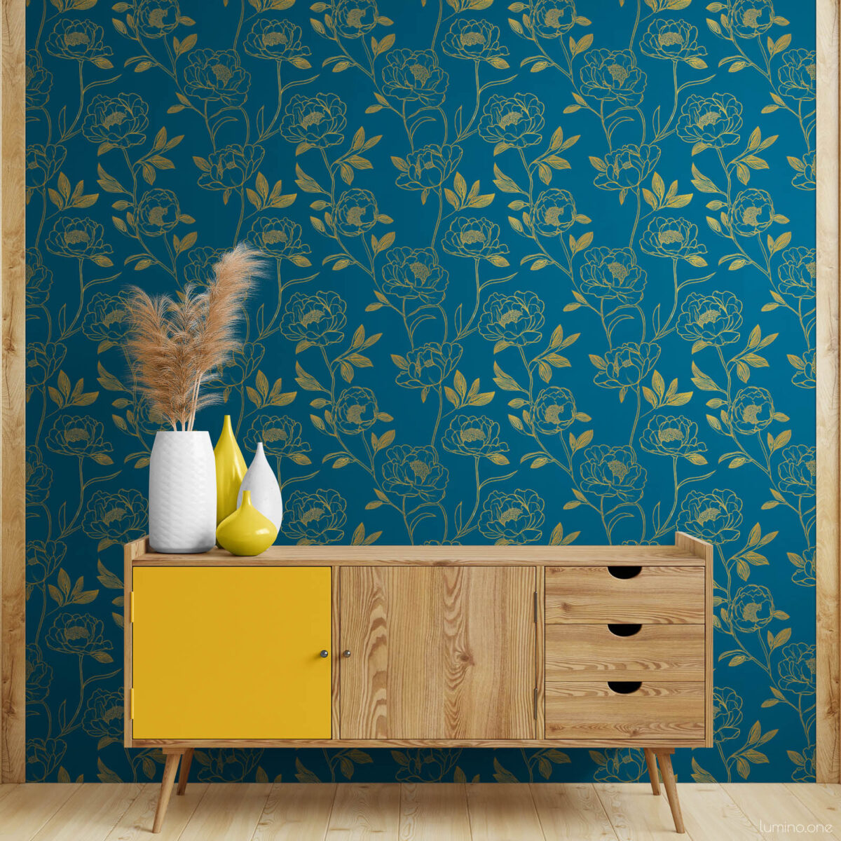 Retro-inspired living room with dark teal and gold peony peel and stick wallpaper, styled with a Scandinavian pine and yellow sideboard topped with white and yellow ceramic vases and dried pampas grass